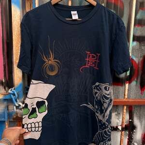 Vintage Y2K Christian Audigier All Over Print Skull Tattoo Graphic T-Shirt